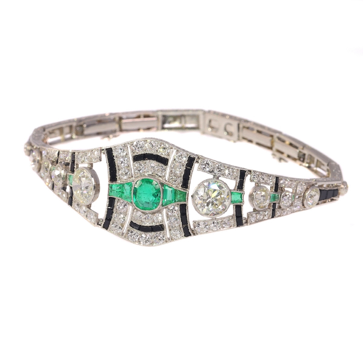 Sophisticated Art Deco Platinum Bracelet: Diamonds, Emeralds, and Onyx